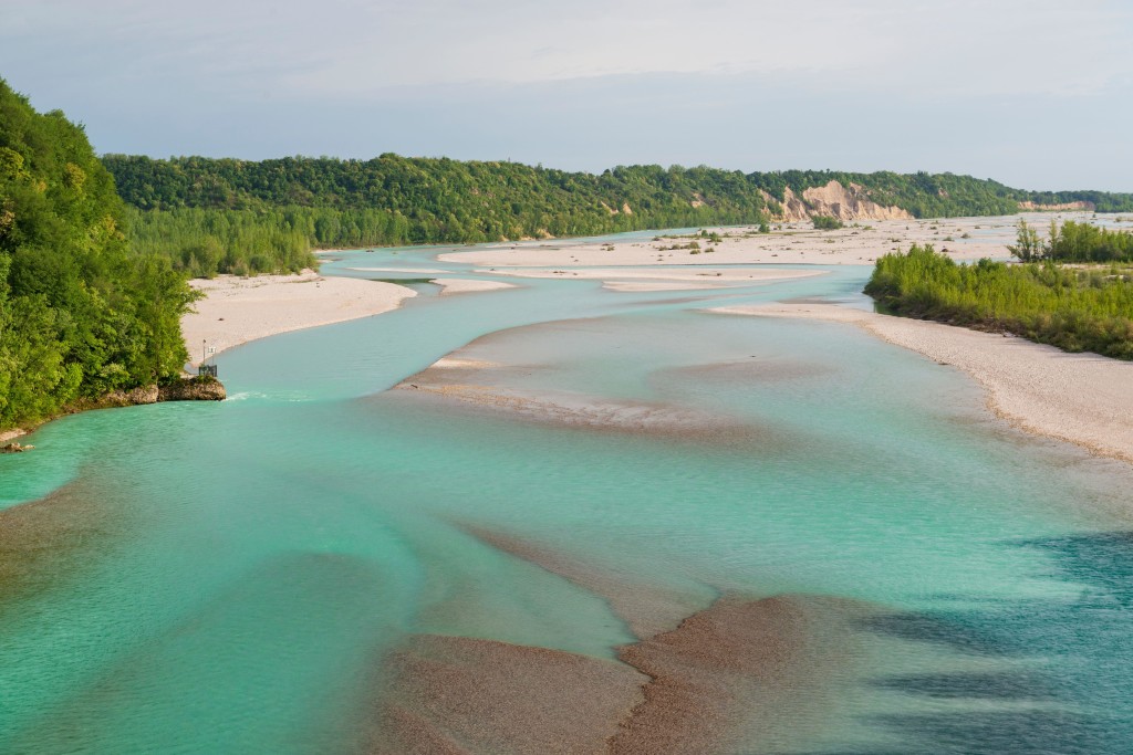 Waters of Tagliamento river in Italy, view from above.
